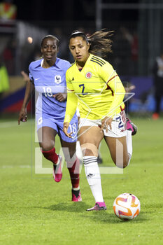 2023-04-07 - Manuela Vanegas of Colombia, Viviane Asseyi of France (left) during the Women's Friendly football match between France and Colombia on April 7, 2023 at Stade Gabriel-Montpied in Clermont-Ferrand, France - FOOTBALL - WOMEN'S FRIENDLY GAME - FRANCE V COLOMBIA - FRIENDLY MATCH - SOCCER