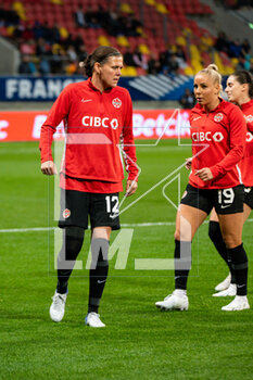 2023-04-11 - Christine Sinclair of Canada and Adriana Leon of Canada warm up ahead of the Women's Friendly football match between France and Canada on April 11, 2023 at Marie-Marvingt stadium in Le Mans, France - FOOTBALL - WOMEN'S FRIENDLY GAME - FRANCE V CANADA - FRIENDLY MATCH - SOCCER