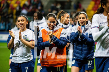 2023-04-11 - Sakina Karchaoui of France and Amel Majri of France celebrate the victory after the Women's Friendly football match between France and Canada on April 11, 2023 at Marie-Marvingt stadium in Le Mans, France - FOOTBALL - WOMEN'S FRIENDLY GAME - FRANCE V CANADA - FRIENDLY MATCH - SOCCER