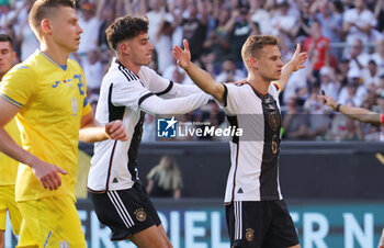 2023-06-12 - Joshua Kimmich of Germany celebrates his goal 3-3 with Kai Havertz during the Friendly football match between Germany and Ukraine on June 12, 2023 at Weserstadion in Bremen, Germany - FOOTBALL - FRIENDLY GAME - GERMANY V UKRAINE - FRIENDLY MATCH - SOCCER