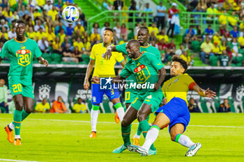 2023-06-20 - Marquinhos scores a goal 2-3, Youssouf Sabaly of Senegal during the International Friendly Football match between Brazil and Senegal on June 20, 2023 at Jose Alvalade stadium in Lisbon, Portugal - FOOTBALL - FRIENDLY GAME - BRAZIL V SENEGAL - FRIENDLY MATCH - SOCCER