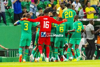 2023-06-20 - Senegal players celebrate the Sadio Mane's goal 1-3 during the International Friendly Football match between Brazil and Senegal on June 20, 2023 at Jose Alvalade stadium in Lisbon, Portugal - FOOTBALL - FRIENDLY GAME - BRAZIL V SENEGAL - FRIENDLY MATCH - SOCCER