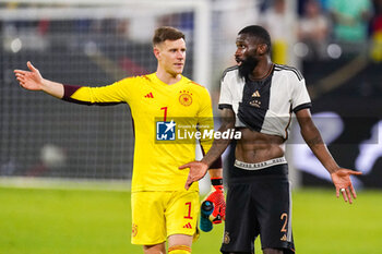 2023-06-20 - Marc-Andre ter Stegen of Germany, Antonio Rudiger of Germany look dejected after losing the International Friendly football match between Germany and Colombia on June 20, 2023 at the Veltins-Arena in Gelsenkirchen, Germany - FOOTBALL - FRIENDLY GAME - GERMANY V COLOMBIA - FRIENDLY MATCH - SOCCER