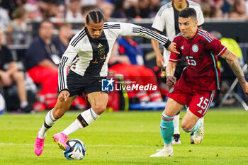 2023-06-20 - Leroy Sane of Germany battle for possession with Mateus Uribe of Colombia during the International Friendly football match between Germany and Colombia on June 20, 2023 at the Veltins-Arena in Gelsenkirchen, Germany - FOOTBALL - FRIENDLY GAME - GERMANY V COLOMBIA - FRIENDLY MATCH - SOCCER