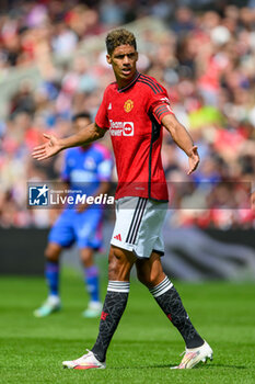 2023-07-19 - Raphael Varane of Manchester United during the pre-season friendly football match between Manchester United and Olympique Lyonnais (Lyon) on 19 July 2023 at the Scottish Gas Murrayfield Stadium in Edinburgh, Scotland - FOOTBALL - FRIENDLY GAME - MANCHESTER UNITED V LYON - FRIENDLY MATCH - SOCCER