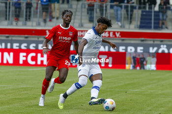2023-08-05 - Juan David Cabal Murillo of Hellas Verona FC battle for the ball with Omar Traoré of FC Heidenheim during FC Heidenheim vs Hellas Verona FC, 11° Max LIEber Cup, at Voith-Arena of Heidenheim, Germany, on August 05, 2023. - FC HEIDENHEIM VS HELLAS VERON - FRIENDLY MATCH - SOCCER