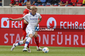 2023-08-05 - Josh Doig of Hellas Verona FC competes for the ball with Marnon Busch of FC Heidenheim during FC Heidenheim vs Hellas Verona FC, 11° Max LIEber Cup, at Voith-Arena of Heidenheim, Germany, on August 05, 2023. - FC HEIDENHEIM VS HELLAS VERON - FRIENDLY MATCH - SOCCER