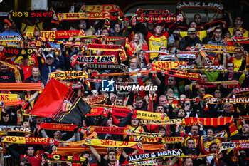 2023-08-02 - Supporters of Lens during the pre-season friendly football match between RC Lens and Torino FC on August 2, 2023 at Bollaert-Delelis stadium in Lens, France - FOOTBALL - FRIENDLY GAME - LENS V TORINO - FRIENDLY MATCH - SOCCER