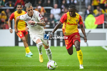 2023-08-02 - Ivan ILIC of Torino and David PEREIRA DA COSTA of Lens during the pre-season friendly football match between RC Lens and Torino FC on August 2, 2023 at Bollaert-Delelis stadium in Lens, France - FOOTBALL - FRIENDLY GAME - LENS V TORINO - FRIENDLY MATCH - SOCCER