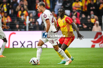 2023-08-02 - Samuele RICCI of Torino and Deiver MACHADO of Lens during the pre-season friendly football match between RC Lens and Torino FC on August 2, 2023 at Bollaert-Delelis stadium in Lens, France - FOOTBALL - FRIENDLY GAME - LENS V TORINO - FRIENDLY MATCH - SOCCER