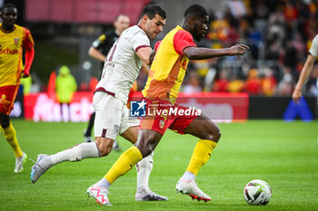 2023-08-02 - Pietro PELLEGRI of Torino and Kevin DANSO of Lens during the pre-season friendly football match between RC Lens and Torino FC on August 2, 2023 at Bollaert-Delelis stadium in Lens, France - FOOTBALL - FRIENDLY GAME - LENS V TORINO - FRIENDLY MATCH - SOCCER