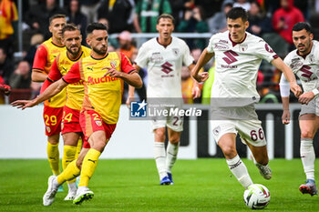 2023-08-02 - Jonathan GRADIT of Lens, Adrien THOMASSON of Lens and Gvidas GINEITIS of Torino during the pre-season friendly football match between RC Lens and Torino FC on August 2, 2023 at Bollaert-Delelis stadium in Lens, France - FOOTBALL - FRIENDLY GAME - LENS V TORINO - FRIENDLY MATCH - SOCCER
