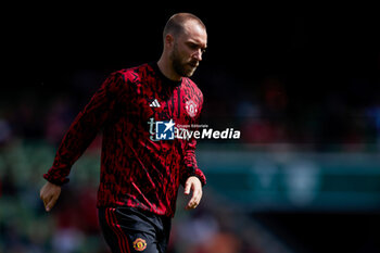 2023-08-06 - Christian Eriksen of Manchester United warms up during the pre-season friendly football match between Manchester United and Athletic Club on August 6, 2023 at Aviva Stadium in Dublin, Ireland - FOOTBALL - FRIENDLY GAME - MANCHESTER UNITED V ATHLETIC CLUB - FRIENDLY MATCH - SOCCER