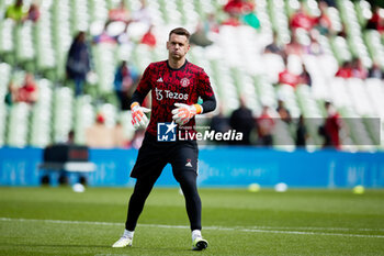 2023-08-06 - Tom Heaton of Manchester United warms up during the pre-season friendly football match between Manchester United and Athletic Club on August 6, 2023 at Aviva Stadium in Dublin, Ireland - FOOTBALL - FRIENDLY GAME - MANCHESTER UNITED V ATHLETIC CLUB - FRIENDLY MATCH - SOCCER