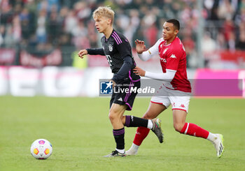 2023-08-07 - Frans Kratzig of Bayern Munich and Vanderson of Monaco during the pre-season Friendly football match between FC Bayern Munich and AS Monaco on August 7, 2023 at Sportpark Unterhaching in Unterhaching, Germany - FOOTBALL - FRIENDLY GAME - BAYERN MUNICH V MONACO - FRIENDLY MATCH - SOCCER