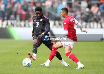 2023-08-07 - Alphonso Davies of Bayern Munich and Vanderson of Monaco during the pre-season Friendly football match between FC Bayern Munich and AS Monaco on August 7, 2023 at Sportpark Unterhaching in Unterhaching, Germany - FOOTBALL - FRIENDLY GAME - BAYERN MUNICH V MONACO - FRIENDLY MATCH - SOCCER