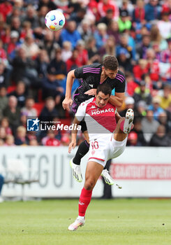 2023-08-07 - Benjamin Pavard of Bayern Munich in duel with Wissam Ben Yedder of Monaco during the pre-season Friendly football match between FC Bayern Munich and AS Monaco on August 7, 2023 at Sportpark Unterhaching in Unterhaching, Germany - FOOTBALL - FRIENDLY GAME - BAYERN MUNICH V MONACO - FRIENDLY MATCH - SOCCER