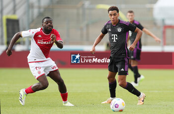 2023-08-07 - Jamal Musiala of Bayern Munich and Youssouf Fofana of Monaco during the pre-season Friendly football match between FC Bayern Munich and AS Monaco on August 7, 2023 at Sportpark Unterhaching in Unterhaching, Germany - FOOTBALL - FRIENDLY GAME - BAYERN MUNICH V MONACO - FRIENDLY MATCH - SOCCER