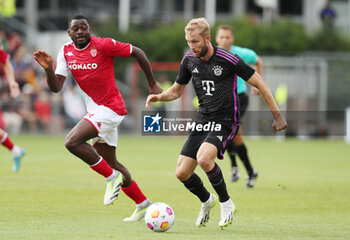 2023-08-07 - Konrad Laimer of Bayern Munich and Youssouf Fofana of Monaco during the pre-season Friendly football match between FC Bayern Munich and AS Monaco on August 7, 2023 at Sportpark Unterhaching in Unterhaching, Germany - FOOTBALL - FRIENDLY GAME - BAYERN MUNICH V MONACO - FRIENDLY MATCH - SOCCER
