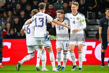 2023-10-17 - Billy GILMOUR of Scotland celebrate his goal with teammates during the International Friendly football match between France and Scotland on October 17, 2023 at Pierre Mauroy stadium in Villeneuve-d'Ascq near Lille, France - FOOTBALL - FRIENDLY GAME - FRANCE V SCOTLAND - FRIENDLY MATCH - SOCCER
