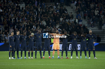 2023-10-17 - Players of France paying tribute to the victims in Israel, Gaza and the french teacher killed by a terrorist during a minute of silence before the International Friendly football match between France and Scotland on October 17, 2023 at Stade Pierre Mauroy in Villeneuve-d'Ascq near Lille, France - FOOTBALL - FRIENDLY GAME - FRANCE V SCOTLAND - FRIENDLY MATCH - SOCCER