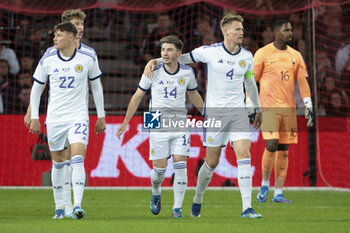 2023-10-17 - Billy Gilmour of Scotland #14 celebrates his goal with teammates during the International Friendly football match between France and Scotland on October 17, 2023 at Stade Pierre Mauroy in Villeneuve-d'Ascq near Lille, France - FOOTBALL - FRIENDLY GAME - FRANCE V SCOTLAND - FRIENDLY MATCH - SOCCER