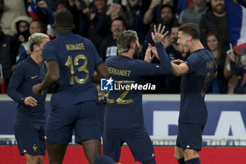 2023-10-17 - Benjamin Pavard of France celebrates his first goal with teammates during the International Friendly football match between France and Scotland on October 17, 2023 at Stade Pierre Mauroy in Villeneuve-d'Ascq near Lille, France - FOOTBALL - FRIENDLY GAME - FRANCE V SCOTLAND - FRIENDLY MATCH - SOCCER