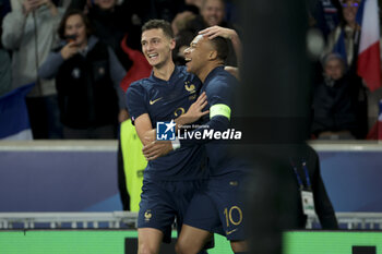 2023-10-17 - Benjamin Pavard of France celebrates his second goal with Kylian Mbappe during the International Friendly football match between France and Scotland on October 17, 2023 at Stade Pierre Mauroy in Villeneuve-d'Ascq near Lille, France - FOOTBALL - FRIENDLY GAME - FRANCE V SCOTLAND - FRIENDLY MATCH - SOCCER