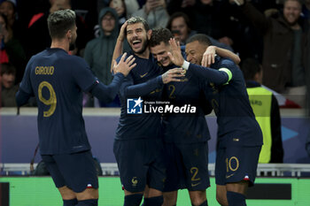 2023-10-17 - Benjamin Pavard of France celebrates his second goal with Olivier Giroud, Theo Hernandez, Kylian Mbappe during the International Friendly football match between France and Scotland on October 17, 2023 at Stade Pierre Mauroy in Villeneuve-d'Ascq near Lille, France - FOOTBALL - FRIENDLY GAME - FRANCE V SCOTLAND - FRIENDLY MATCH - SOCCER