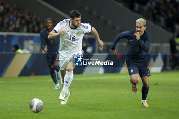 2023-10-17 - Scott McKenna of Scotland, Antoine Griezmann of France during the International Friendly football match between France and Scotland on October 17, 2023 at Stade Pierre Mauroy in Villeneuve-d'Ascq near Lille, France - FOOTBALL - FRIENDLY GAME - FRANCE V SCOTLAND - FRIENDLY MATCH - SOCCER