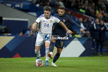 2023-10-17 - Billy Gilmour of Scotland, Jonathan Clauss of France during the International Friendly football match between France and Scotland on October 17, 2023 at Stade Pierre Mauroy in Villeneuve-d'Ascq near Lille, France - FOOTBALL - FRIENDLY GAME - FRANCE V SCOTLAND - FRIENDLY MATCH - SOCCER