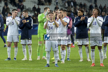 2023-10-17 - Billy Gilmour of Scotland and teammates salute the supporters following the International Friendly football match between France and Scotland on October 17, 2023 at Stade Pierre Mauroy in Villeneuve-d'Ascq near Lille, France - FOOTBALL - FRIENDLY GAME - FRANCE V SCOTLAND - FRIENDLY MATCH - SOCCER