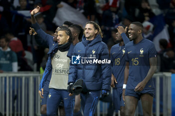 2023-10-17 - Malo Gusto, Adrien Rabiot, Marcus Thuram of France salute the supporters following the International Friendly football match between France and Scotland on October 17, 2023 at Stade Pierre Mauroy in Villeneuve-d'Ascq near Lille, France - FOOTBALL - FRIENDLY GAME - FRANCE V SCOTLAND - FRIENDLY MATCH - SOCCER