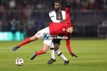 2023-11-18 - İrfan Kahveci of Turkey and Antonio Rudiger of Germany during the International Friendly football match between Germany and Turkey on November 18, 2023 at Olympiastadion in Berlin, Germany - FOOTBALL - FRIENDLY GAME - GERMANY V TURKEY - FRIENDLY MATCH - SOCCER