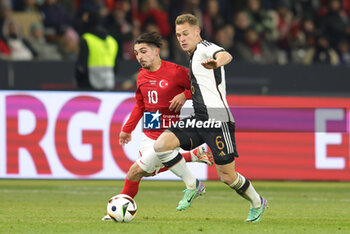 2023-11-18 - Abdulkadir Omur of Turkey and Joshua Kimmich of Germany during the International Friendly football match between Germany and Turkey on November 18, 2023 at Olympiastadion in Berlin, Germany - FOOTBALL - FRIENDLY GAME - GERMANY V TURKEY - FRIENDLY MATCH - SOCCER