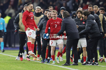 2023-11-18 - Yusuf Sari (17) of Turkey celebrates his goal 2-3 with coach Vincenzo Montella during the International Friendly football match between Germany and Turkey on November 18, 2023 at Olympiastadion in Berlin, Germany - FOOTBALL - FRIENDLY GAME - GERMANY V TURKEY - FRIENDLY MATCH - SOCCER