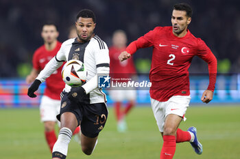 2023-11-18 - Serge Gnabry of Germany and Zeki Celik of Turkey during the International Friendly football match between Germany and Turkey on November 18, 2023 at Olympiastadion in Berlin, Germany - FOOTBALL - FRIENDLY GAME - GERMANY V TURKEY - FRIENDLY MATCH - SOCCER