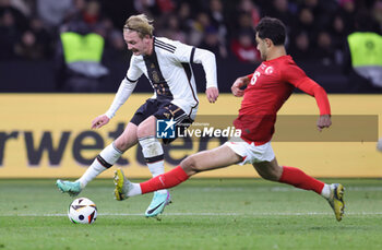 2023-11-18 - Julian Brandt of Germany and Ozan Kabak of Turkey during the International Friendly football match between Germany and Turkey on November 18, 2023 at Olympiastadion in Berlin, Germany - FOOTBALL - FRIENDLY GAME - GERMANY V TURKEY - FRIENDLY MATCH - SOCCER