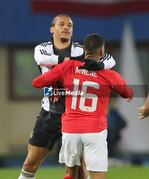2023-11-21 - Clash between Leroy Sane of Germany and Phillipp Mwene of Austria during the International Friendly football match between Austria and Germany on November 21, 2023 at Ernst Happel Stadium in Vienna, Austria - FOOTBALL - FRIENDLY GAME - AUSTRIA V GERMANY - FRIENDLY MATCH - SOCCER