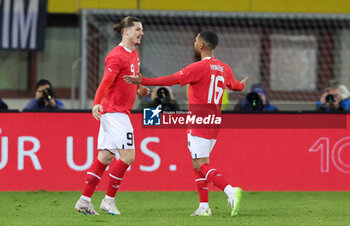 2023-11-21 - Marcel Sabitzer of Austria celebrates his goal 1-0 with Phillipp Mwene during the International Friendly football match between Austria and Germany on November 21, 2023 at Ernst Happel Stadium in Vienna, Austria - FOOTBALL - FRIENDLY GAME - AUSTRIA V GERMANY - FRIENDLY MATCH - SOCCER