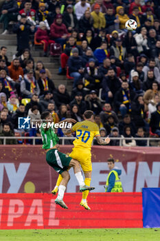 2023-12-11 - Dennis Man of Romania and Shea Charles of Northern Ireland during the International Friendly football match between Romania and Northern Ireland on March 22, 2024 at Arena Nationala in Bucharest, Romania - FOOTBALL - FRIENDLY GAME - ROMANIA V NORTHERN IRELAND - FRIENDLY MATCH - SOCCER