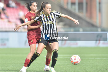 2023-06-04 - Lisa Boattin of Juventus FC competes for the ball with Leonardo Spinazzola of AS Roma during the Italian Cup Final between AS Roma vs Juventus FC at Arechi Stadium - FINAL - JUVENTUS FC VS AS ROMA - WOMEN ITALIAN CUP - SOCCER