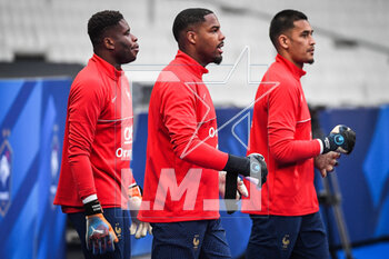 2023-03-23 - Brice SAMBA of France, Mike MAIGNAN of France and Alphonse AREOLA of France during the training of the French team ahead of the UEFA Euro 2024, European Qualifiers football match between France and Netherlands, on March 23, 2023 at Stade de France in Saint-Denis near Paris, France - FOOTBALL - FRANCE V NETHERLANDS - TRAINING AND PRESS CONFERENCE - UEFA EUROPEAN - SOCCER