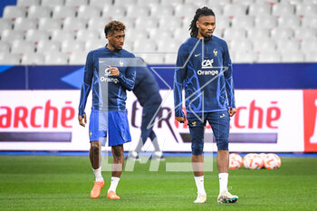 2023-03-23 - Kingsley COMAN of France and Khephren THURAM of France during the training of the French team ahead of the UEFA Euro 2024, European Qualifiers football match between France and Netherlands, on March 23, 2023 at Stade de France in Saint-Denis near Paris, France - FOOTBALL - FRANCE V NETHERLANDS - TRAINING AND PRESS CONFERENCE - UEFA EUROPEAN - SOCCER