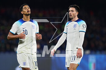 2023-03-23 - Jude Bellingham (L) and Jack Grealish (R) of England react during the UEFA Euro 2024, European Qualifiers, Group C football match between Italy and England on March 23, 2023 at Stadio Diego Armando Maradona in Naples, Italy - FOOTBALL - EURO 2024 - QUALIFYING - ITALY V ENGLAND - UEFA EUROPEAN - SOCCER