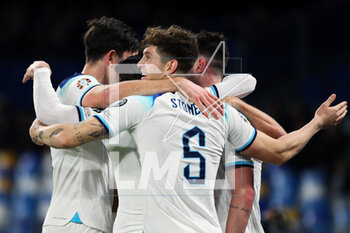 2023-03-23 - Jhon Stones of England celebrates Declan Rice's 0-1 goal with his teammates during the UEFA Euro 2024, European Qualifiers, Group C football match between Italy and England on March 23, 2023 at Stadio Diego Armando Maradona in Naples, Italy - FOOTBALL - EURO 2024 - QUALIFYING - ITALY V ENGLAND - UEFA EUROPEAN - SOCCER