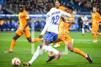 2023-03-24 - Randal KOLO MUANI of France and Jurrien TIMBER of Netherlands during the UEFA Euro 2024, European Qualifiers, Group B football match between France and Netherlands on March 24, 2023 at Stade de France in Saint-Denis near Paris, France - FOOTBALL - EURO 2024 - QUALIFYING - FRANCE V NETHERLANDS - UEFA EUROPEAN - SOCCER