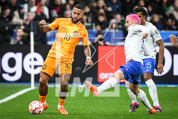 2023-03-24 - Memphis DEPAY of Netherlands and Antoine GRIEZMANN of France during the UEFA Euro 2024, European Qualifiers, Group B football match between France and Netherlands on March 24, 2023 at Stade de France in Saint-Denis near Paris, France - FOOTBALL - EURO 2024 - QUALIFYING - FRANCE V NETHERLANDS - UEFA EUROPEAN - SOCCER