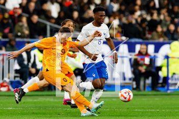 2023-03-24 - Marten de Roon of the Netherlands is challenged by Aurelien Tchouameni of France during the UEFA Euro 2024, European Qualifiers, Group B football match between France and Netherlands on March 24, 2023 at Stade de France in Saint-Denis near Paris, France - FOOTBALL - EURO 2024 - QUALIFYING - FRANCE V NETHERLANDS - UEFA EUROPEAN - SOCCER