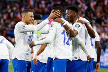 2023-03-24 - Kylian Mbappe of France and Randal Kolo Muani of France celebrate their sides third goal during the UEFA Euro 2024, European Qualifiers, Group B football match between France and Netherlands on March 24, 2023 at Stade de France in Saint-Denis near Paris, France - FOOTBALL - EURO 2024 - QUALIFYING - FRANCE V NETHERLANDS - UEFA EUROPEAN - SOCCER